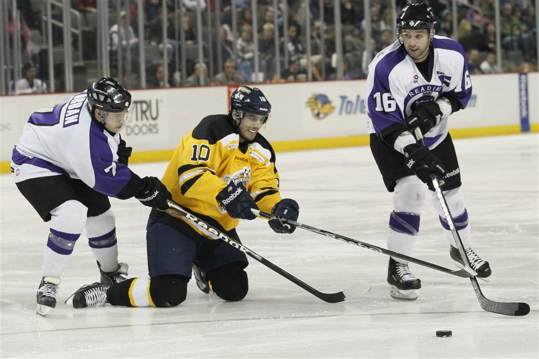 Toledo-Walleye-player-David-Gilbert-battles-for-the-puck