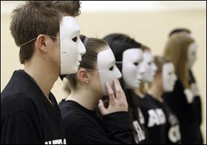 A skit called 'Turnaround' has masked players in shirts labeled with drug names such as pot. A girl acts out drinking herself into insensibility and then rushing into the embrace of the 'drugs.'