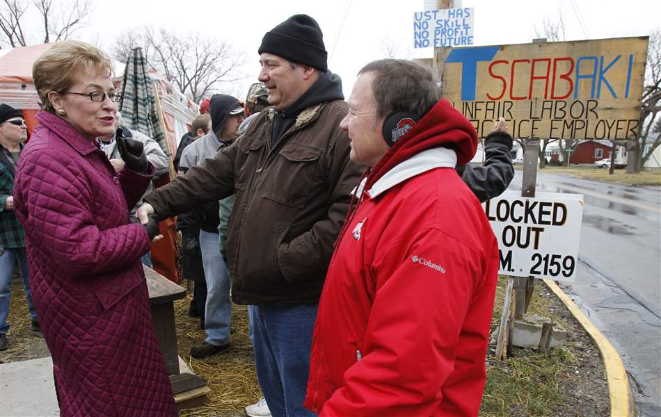 Above-left-Marcy-Kaptur-talks-with-brothers-Larry-Lippert-a-locked-out-machinist