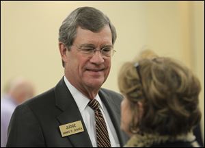 Judge James Jensen, who seeks a seat on the Ohio District Court of Appeals, speaks with Janice Lower.