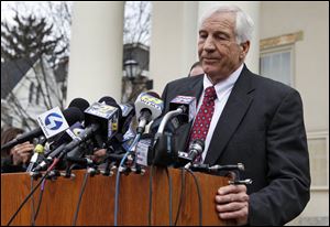 Jerry Sandusky, a former Penn State assistant football coach charged with sexually abusing boys, pauses Friday while speaking to the media at the Centre County Courthouse after a bail conditions hearing in Bellefonte, Pa. 