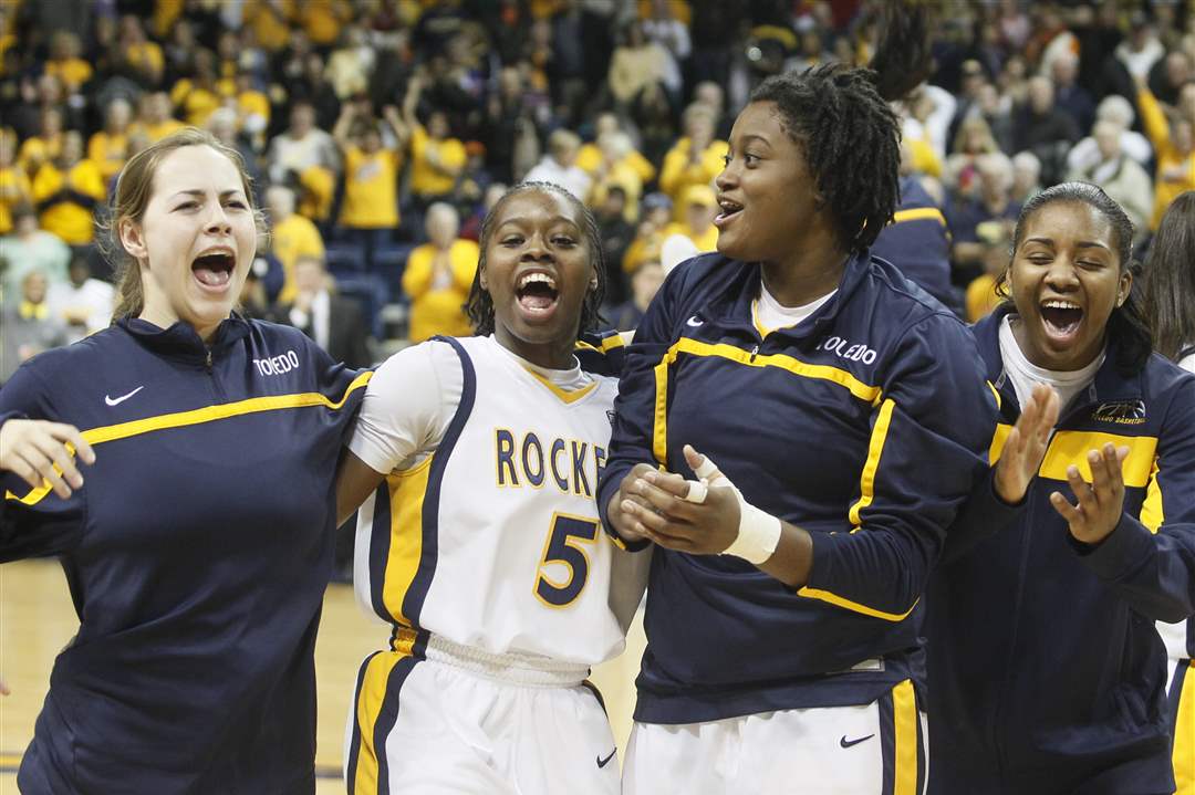 UT-players-Anna-Capotosto-left-Janelle-Reed-Lewis-5-Brianna-Jones-and-Mariah-Carson