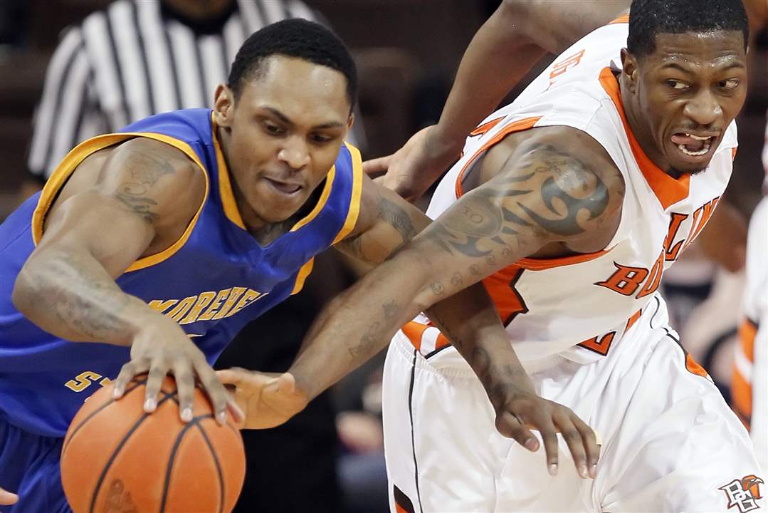 BGSU-forward-Torian-Oglesby-steals-a-ball-from-Morehead-State-s-Will-Bailey