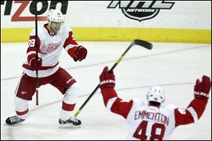 Detroit Red Wings' Jan Mursak, left, of Slovenia celebrates with teammate Cory Emmerton after Mursak's goal against the Columbus Blue Jackets in the third period on Tuesday.