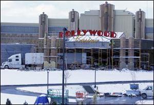 A truck is unloaded in front of the Hollywood Casino.