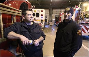 Firefighters Dan Lietaert, left, and Jesse Garcia say they aren't happy with the pay cuts, but they said they are relieved to have the contract. 'I'm relieved I'm not being gutted and left out in the street,' Mr. Lietaert said. 'But nobody's ever happy taking a pay cut.'