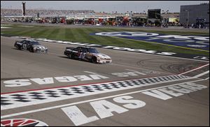 Tony Stewart races to victory in the Kobalt Tools 400 at Las Vegas Motor Speedway on Sunday.

