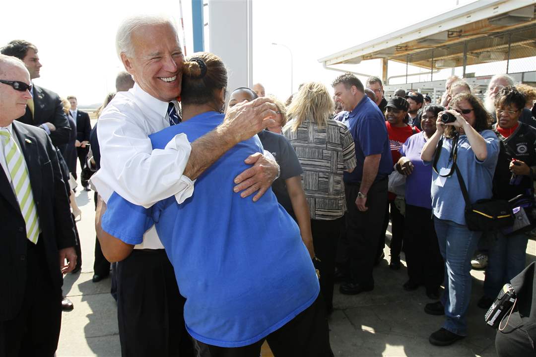 biden-hugs-worker