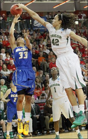 Baylor's Brittney Griner blocks a shot of UC Santa Barbara's Destini Mason in a NCAA tournament game at BGSU. Griner was the defensive player of the year last year and has more blocks this season.