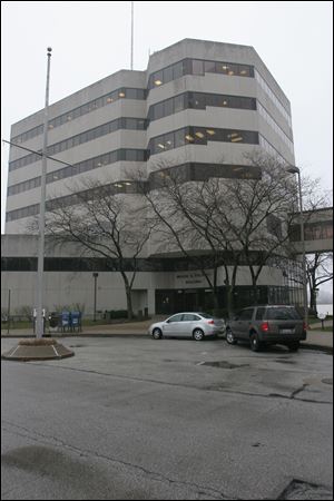 The sale of One Maritime Plaza, a seven-story office building on the Maumee River, has drawn controversy.