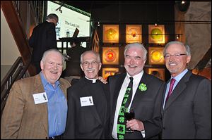 From left, Don Harbaugh, Father Ron Olszewski, President of St. Francis de Sales High School, Tom McHugh, and Mike Gibbons at the St. Francis de Sales' Knight of the Vine event.