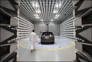 A engineer walks into the radio frequency shielding chamber at Honda Research & Development in Raymond, Ohio.