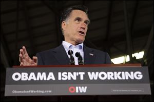 GOP presidential hopeful Mitt Romney speaks at a closed National Gypsum drywall factory in Lorain, Ohio.