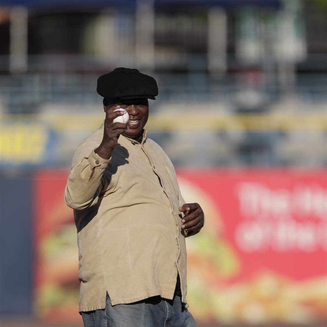 Buster-Douglas-throws-out-an-honorary-first-pitch