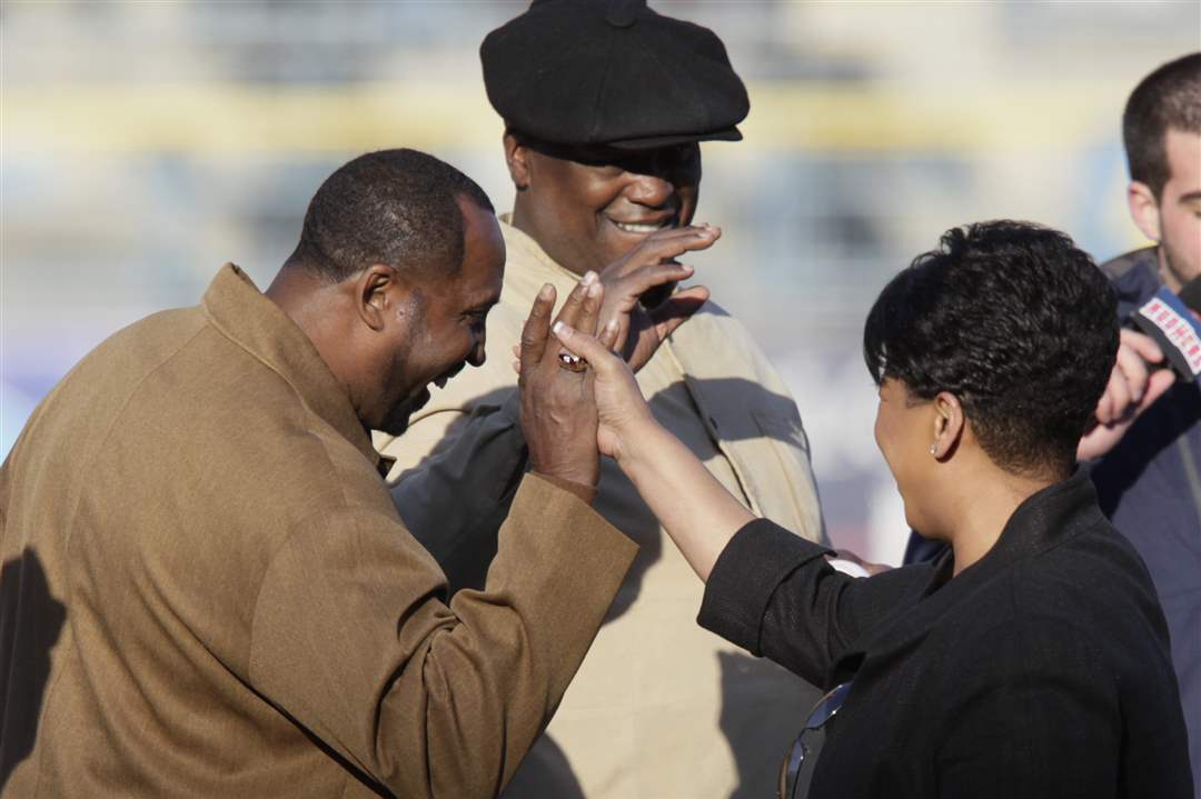 Motor-City-boxing-champion-Tommy-Hearns-left-world-champion-Buster-Douglas-and-Ohio-Supreme-Court-Justice-Yvette-McGee-Brown