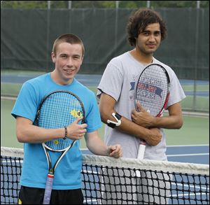 Ryan Brown, a sophomore, left, and Madhav Mehta, a senior,
are 17-1 this season as the No. 1 doubles team for the Titans.