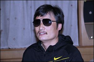 Blind Chinese legal activist Chen Guangcheng is seen at an undisclosed location in Beijing during an April meeting with human rights activists Hu Jia and Zeng Jinyan.