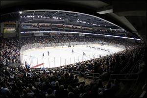 Fans pack the Huntington Center for a Walleye game. Although Toledo ranks high as a minor league market, its immediate chances are slim of competing in the American Hockey League, hockey's equivalent to Triple-A baseball.