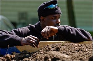 Joe Person, 27, was released from prison in 2010, leaving
with a promise from Peterson Mingo that there would be work waiting for him. He’s part of a landscaping crew and says he’d like to study business.