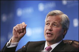 James Dimon, chairman and CEO of JP Morgan Chase & Co., speaks in New York. JPMorgan Chase, the largest bank in the United States, said that it lost $2 billion in the past six weeks in a trading portfolio designed to hedge against risks the company takes with its own money.