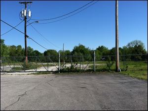 As part of a proposed development project, Lourdes University would like to add a new parking lot area to this space at the intersection of Brint and McCord.