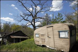 The landscape in Meigs County and surrounding areas is filled with run-down trailers and old coal-company houses that pass for homes. Some families are doubling or tripling up.