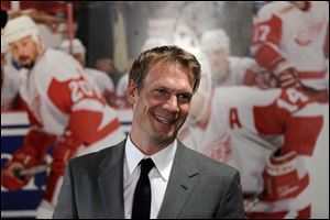 Nicklas Lidstrom, 42, set an NHL record by playing 1,564 games with a single team. He helped the Red Wings win four Stanley Cups.