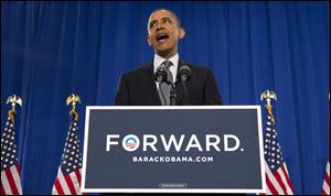 President Obama addresses a rally at Cuyahoga Community College in Cleveland. Thursday's trip to the county, which has the largest concentration of Democrats in Ohio, was his eighth since taking office in 2009. 