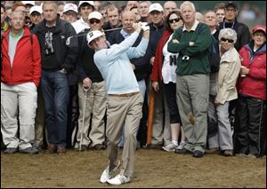 Brandt Snedeker of the United States plays a shot from the rough on the second hole at Royal Lytham & St Annes golf club during the second round of the British Open Golf Championship, Lytham St Annes, England, Friday.