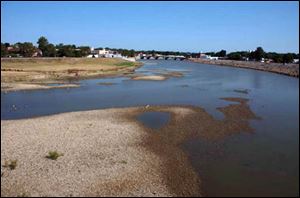 A dry summer and ongoing drought have dropped the water level in the Sandusky River at Fremont.