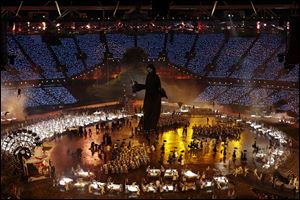 Artists perform during the Opening Ceremony at the 2012 Summer Olympics.