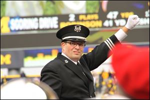 Elmore native Jon Waters, interim director of the Ohio State Marching Band, directs the legendary 225-member band. He says he still gets chills when conducting the fight song.