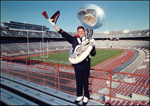 Jon Waters celebrates before the Ohio State-Michigan game in 1998, knowing his dream is coming true: He'll dot the 'i' in 'Script Ohio.'