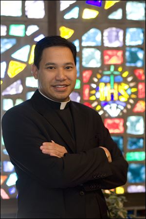 The Rev. Joaquin Martinez, president of St. John's Jesuit High School and Academy, will share the school's success with technology, including the use of iPads in the classroom, with 400 colleagues from 61 countries who will be attending a conference in Boston.  The event begins Sunday. 