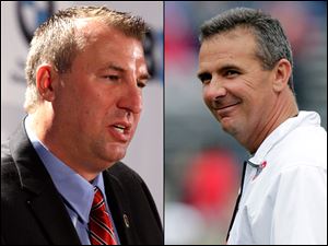 Wisconsin coach Bret Bielema, left, and Ohio State coach Urban Meyer.