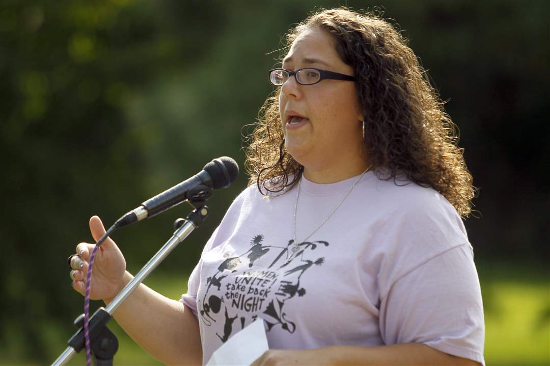 Rebecca-Facey-speaks-during-a-vigil