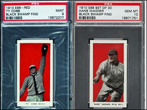 A 1910 Ty Cobb baseball card, left, and a 1910 Honus Wagner card were among 37 cards from a collection found in Defiance that were auctioned Thursday in Baltimore.