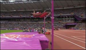 Erik Kynard clears 2.25 meters in the men's high jump final in London.