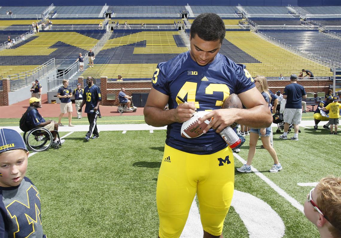 Whitmer graduate Wormley tears ACL at Michigan practice