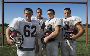 Genoa had its 48-game regular-season winning streak ended last year by Eastwood. The Comets will contend again for the NBC title with, from left, John Belsky, Kyle Nutter, Zach Roberts, and Nick Keller.