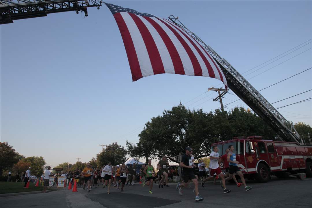 Racers-start-the-race-under-the-U-S-flag