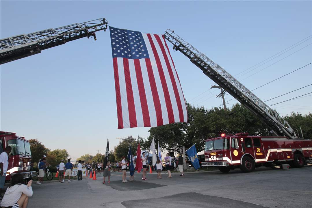 The-POW-MIA-flag-is-joined-by-service-flags-at-the-start-line