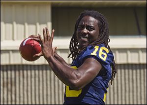 Quarterback Denard Robinson is a big reason Michigan has high hopes going into the season, which starts Saturday night against Alabama.