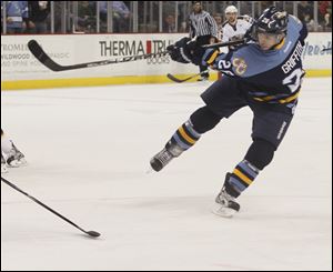 Toledo Walleye #26, Todd Griffith, shooting.