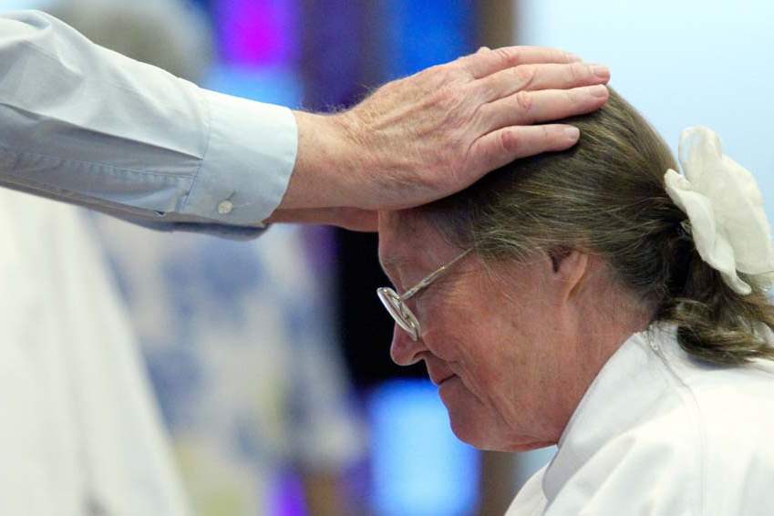 CTY-ordination14p-laying-of-hands-closeup