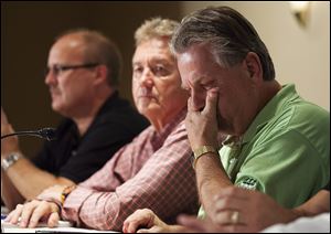 Canadian Auto Workers union president Ken Lewenza, right, said Ford has shown a willingness to reach an agreement. He said talks with Chrysler and General Motors will continue but high level talks will be focused on Ford. A strike at all three automakers would affect about 20,000 workers and about 16 percent of North American auto production.