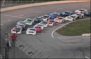 The 24th running of the Great Lakes Helicopter Glass City 200 at the Toledo Speedway gets under way.