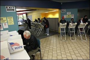 Voters cast their votes at the early vote center at Summit Plaza this morning. It's the first day of early voting in Ohio.