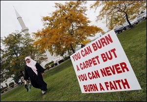 A sign is placed outside a tent for Jumah prayer Friday on the grounds of the Islamic Center of Greater Toledo.