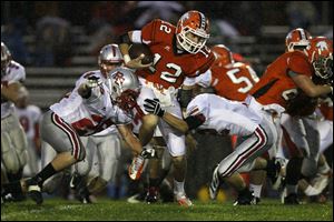 Southview's Damian Griesinger runs the ball against Bowling Green on Friday night in Sylvania.